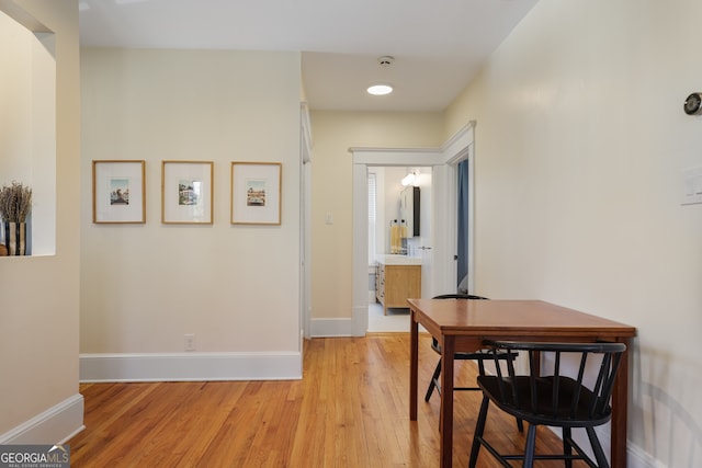 hall with light hardwood / wood-style flooring