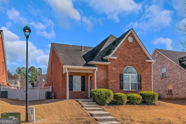 view of property featuring a front yard