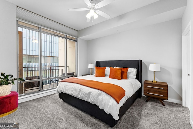 bedroom with access to outside, carpet, a wall of windows, baseboards, and ceiling fan