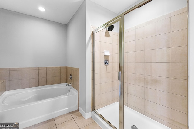 full bath with tile patterned floors, recessed lighting, a bath, and a shower stall