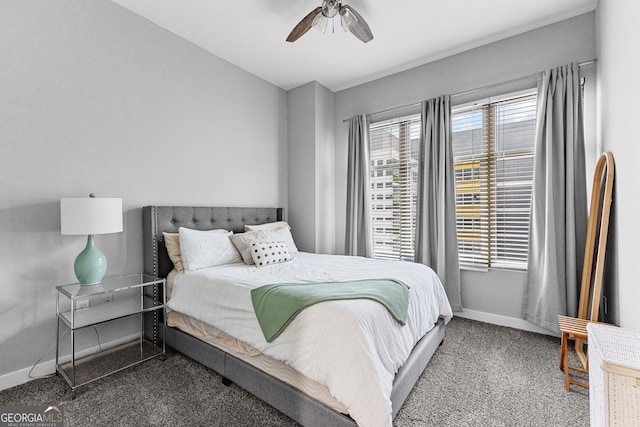 bedroom featuring ceiling fan, carpet, and baseboards