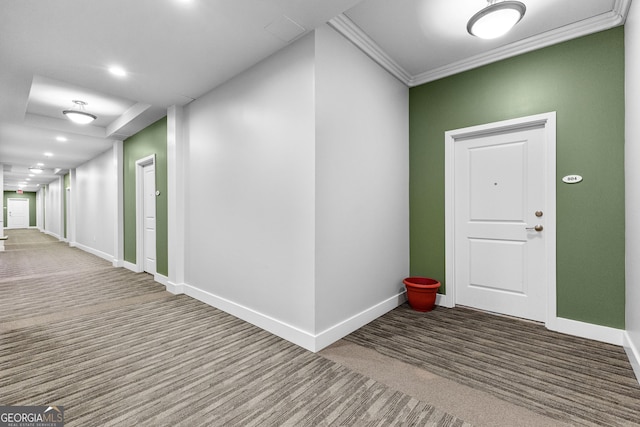 interior space featuring recessed lighting, baseboards, carpet, and ornamental molding