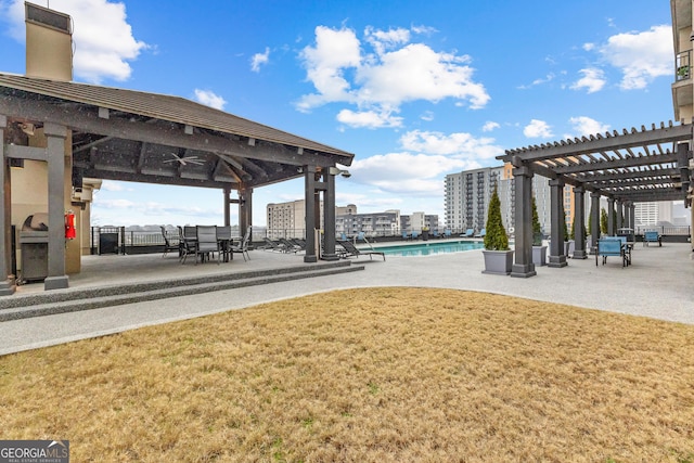 surrounding community featuring a lawn, a pergola, a patio, a gazebo, and a pool