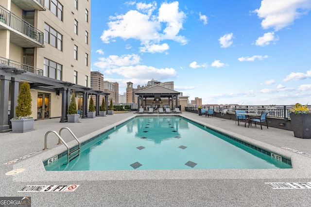 community pool featuring a patio area