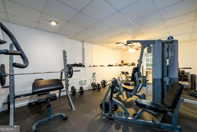 gym featuring a drop ceiling