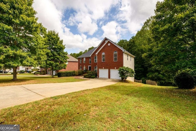 view of side of home featuring a garage, concrete driveway, brick siding, and a yard