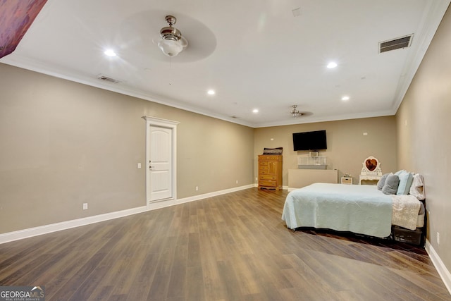 bedroom featuring hardwood / wood-style flooring and ornamental molding