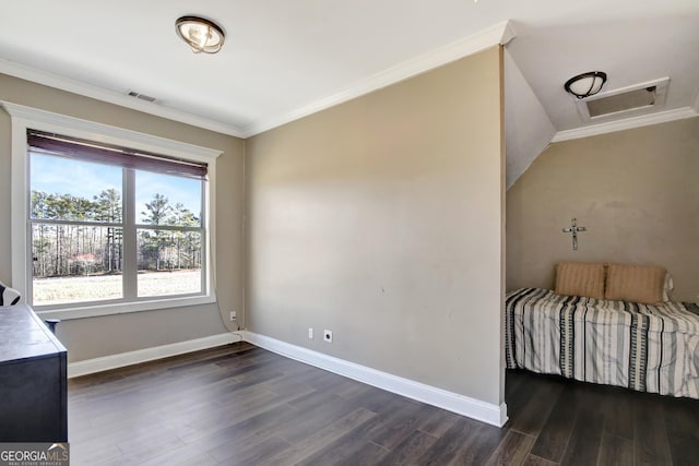 bedroom with ornamental molding and dark hardwood / wood-style flooring