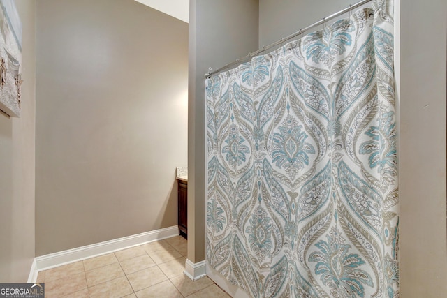 bathroom with vanity and tile patterned floors