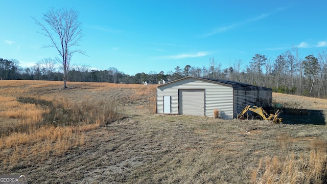 view of outdoor structure featuring a garage