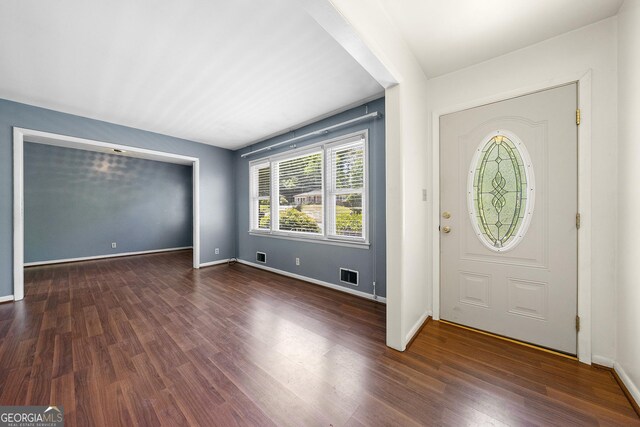 entrance foyer featuring dark wood-type flooring