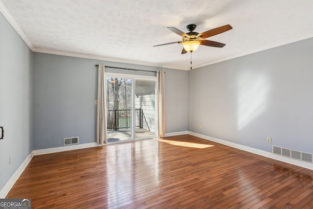 empty room with hardwood / wood-style floors, crown molding, and ceiling fan