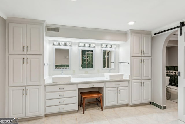 213 Pine Crest Dr, Cumming, GA 30040 - bathroom featuring double vanity, tile patterned flooring, and recessed lighting