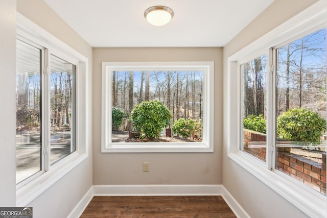 213 Pine Crest Dr, Cumming, GA 30040 - unfurnished sunroom with wood finished floors and baseboards