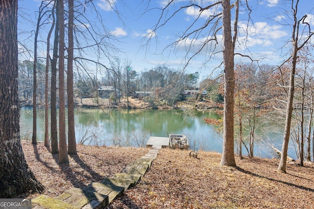 exterior space with a water view