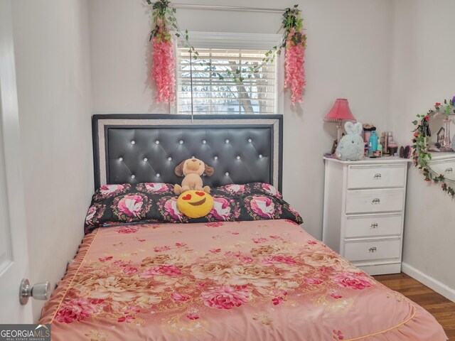 bedroom with light hardwood / wood-style floors