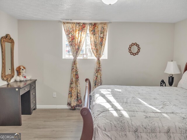 kitchen featuring sink, decorative backsplash, light stone countertops, and appliances with stainless steel finishes