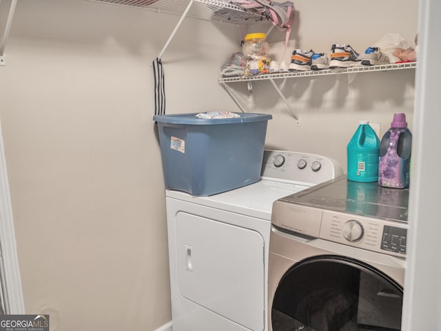 laundry area featuring laundry area and independent washer and dryer