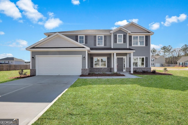 view of front facade featuring concrete driveway, a garage, fence, and a front yard