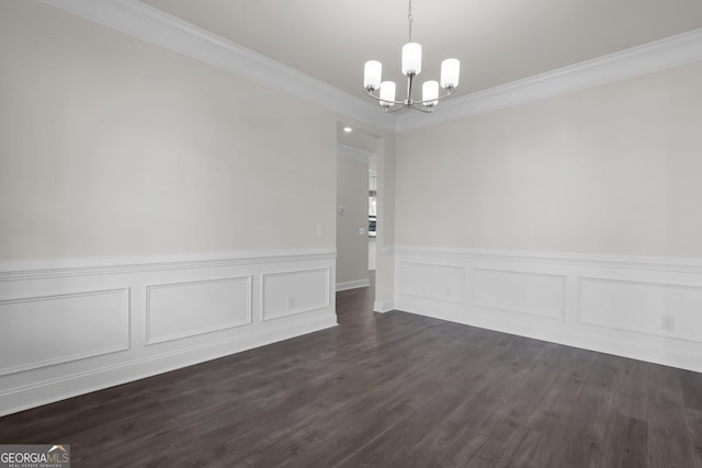 unfurnished dining area featuring crown molding, dark wood-style flooring, and a chandelier