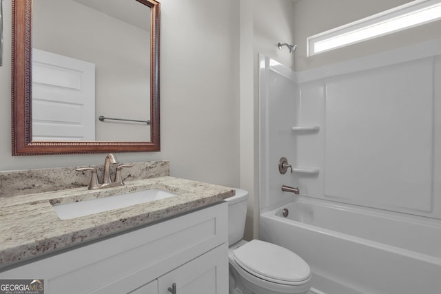 full bathroom with vanity, toilet, and shower / washtub combination