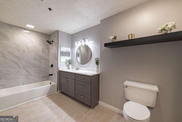 full bathroom featuring tiled shower / bath, vanity, toilet, tile patterned floors, and a textured ceiling