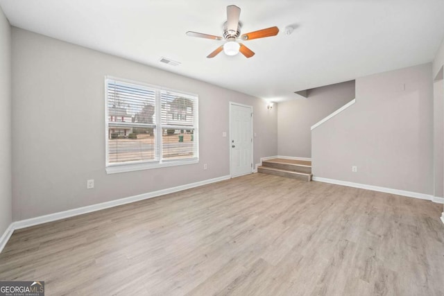 interior space featuring ceiling fan and light wood-type flooring