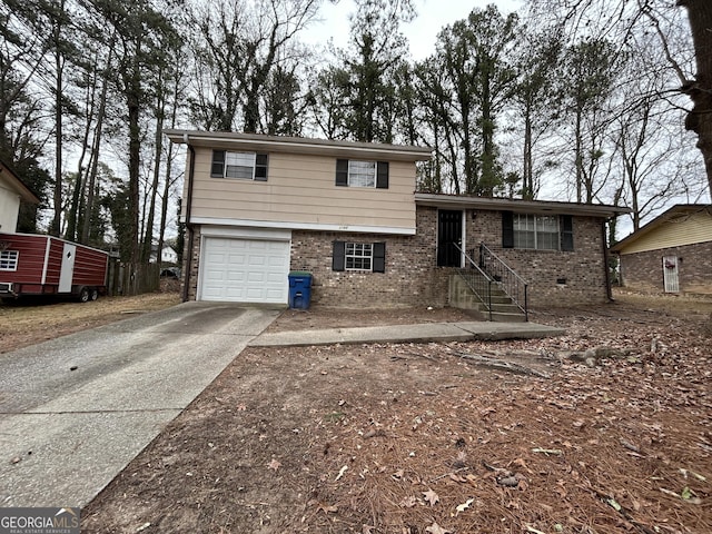 split level home featuring a garage