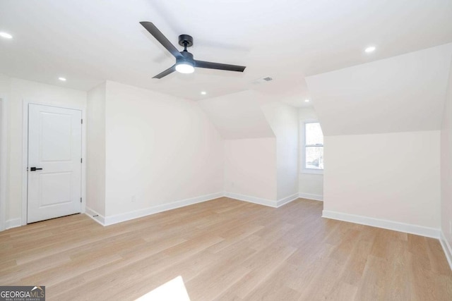 bonus room featuring ceiling fan, lofted ceiling, and light hardwood / wood-style floors