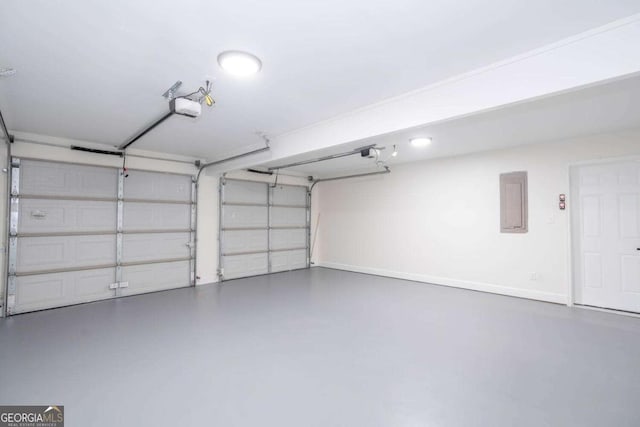 garage featuring a garage door opener and electric panel