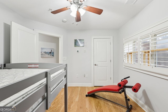 interior space featuring light hardwood / wood-style floors and ceiling fan