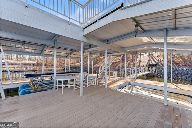 view of dock with a water view