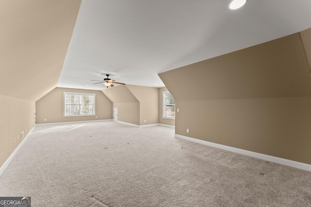 bonus room featuring carpet and lofted ceiling