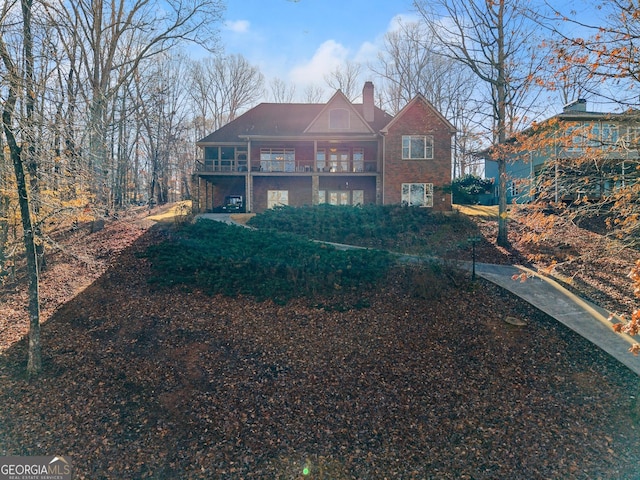 view of front of house with a balcony