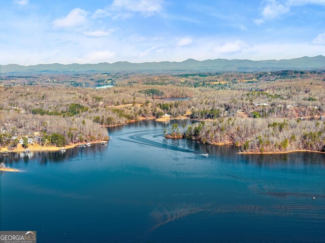 aerial view with a water and mountain view