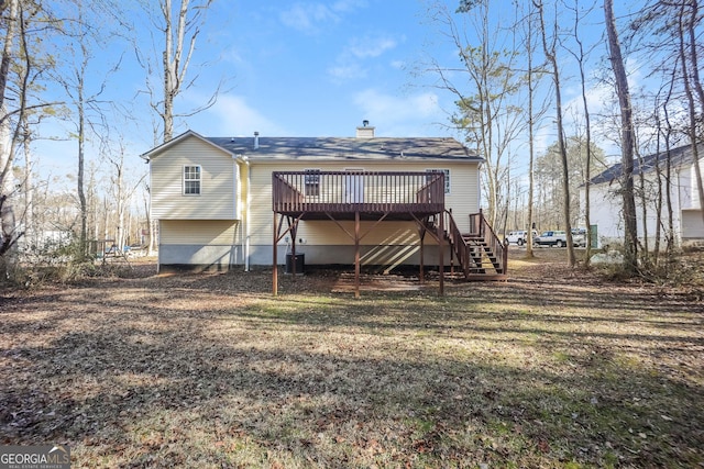 rear view of property with a deck