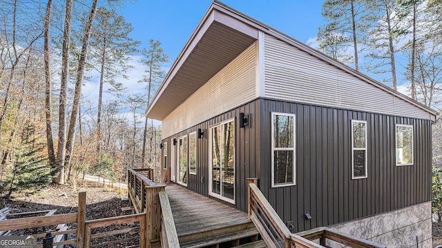 view of side of home featuring a deck