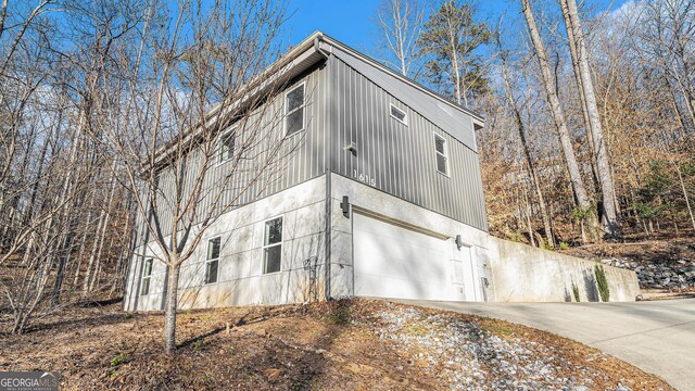 view of property exterior with a garage