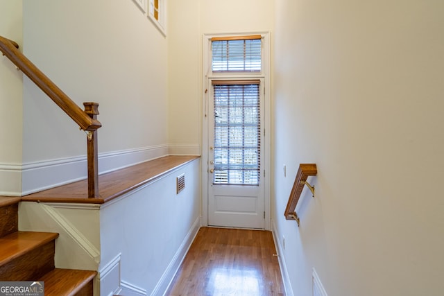 doorway featuring wood-type flooring