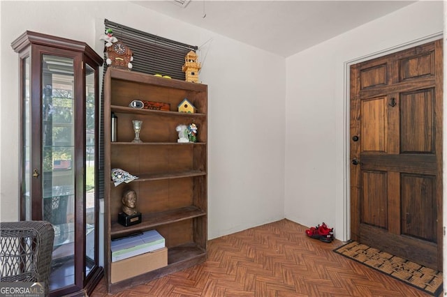 foyer entrance with parquet floors