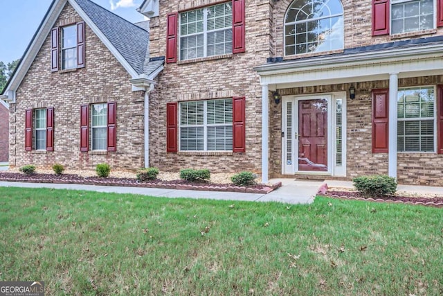 view of front facade with a front yard