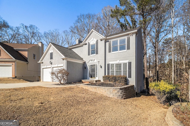 front of property featuring a garage