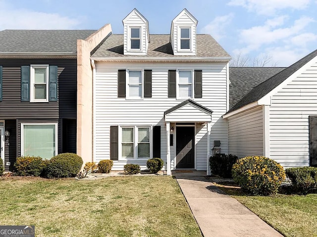 view of front of house with a front lawn