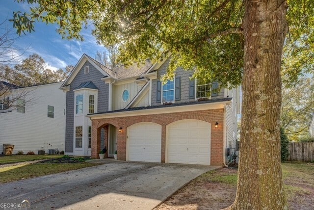 view of front of property with a garage