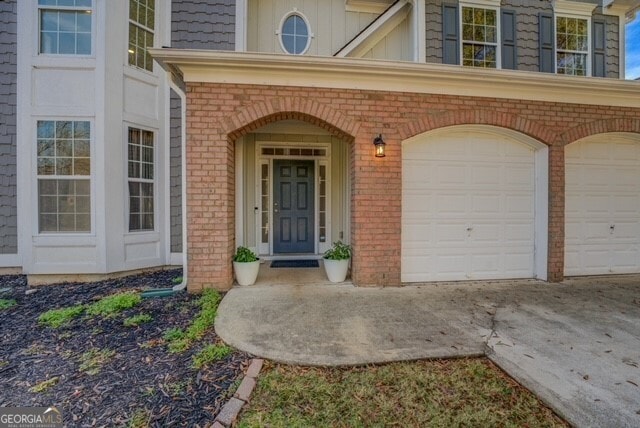 property entrance with a garage