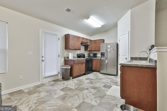 kitchen with vaulted ceiling, sink, and black appliances