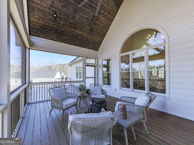 sunroom / solarium with vaulted ceiling and wooden ceiling