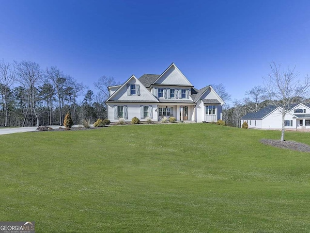 view of front facade with a front yard