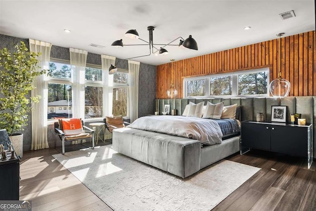 bedroom featuring dark hardwood / wood-style flooring