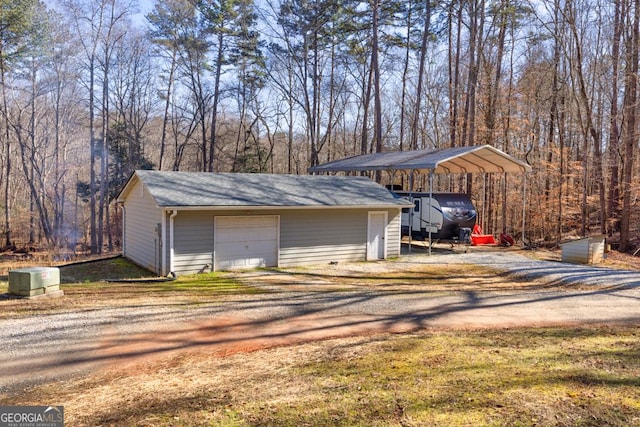 garage with a carport